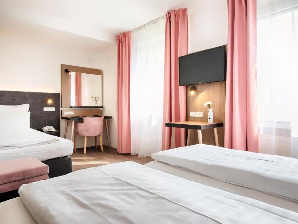 Home Hotel : photo 7 de la chambre chambre triple