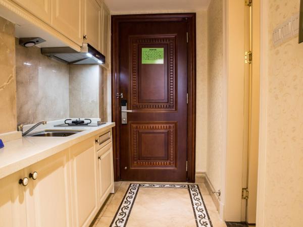 WAIFIDEN Guangzhou HaiZhu Square WanYi Apartment : photo 6 de la chambre chambre lit king-size deluxe