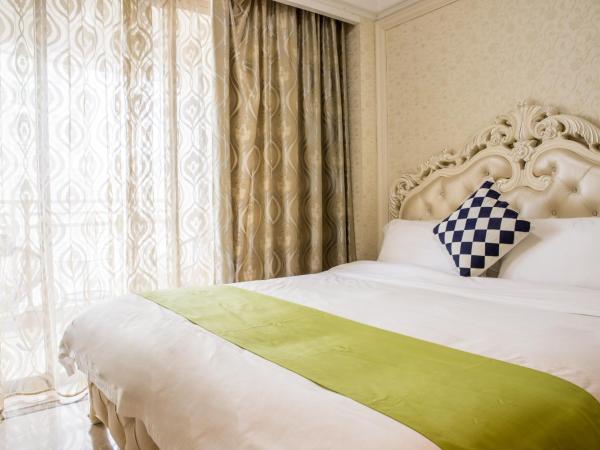 WAIFIDEN Guangzhou HaiZhu Square WanYi Apartment : photo 10 de la chambre chambre lit king-size deluxe