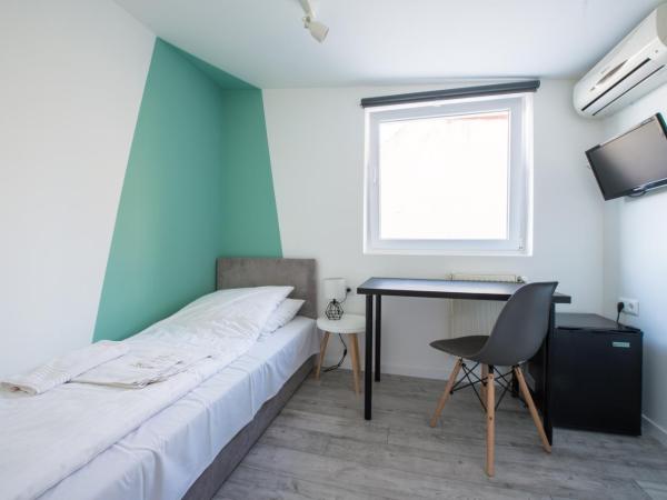 Chesscom Guesthouse : photo 1 de la chambre petite chambre simple
