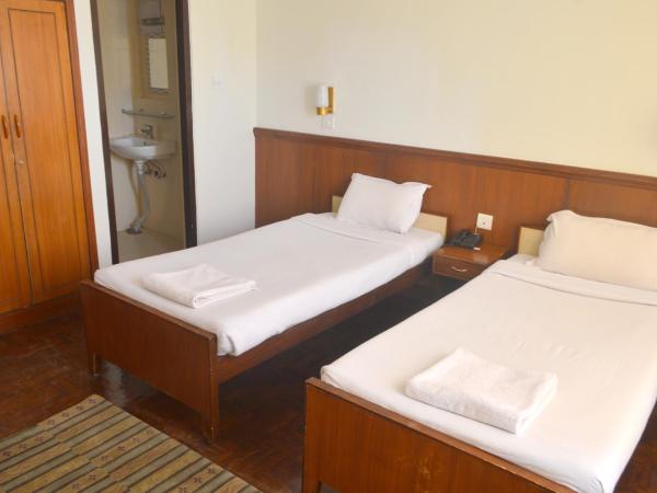 Potala Guest House : photo 4 de la chambre chambre double ou lits jumeaux standard