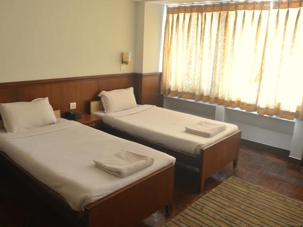 Potala Guest House : photo 6 de la chambre chambre double ou lits jumeaux standard