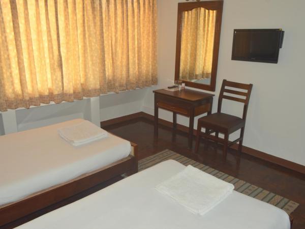 Potala Guest House : photo 7 de la chambre chambre double ou lits jumeaux standard