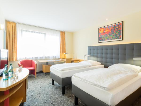 ABACUS Tierpark Hotel : photo 1 de la chambre chambre double ou lits jumeaux