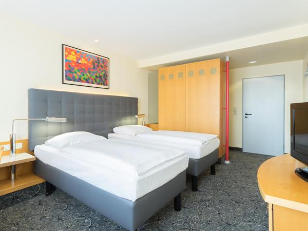 ABACUS Tierpark Hotel : photo 3 de la chambre chambre double ou lits jumeaux