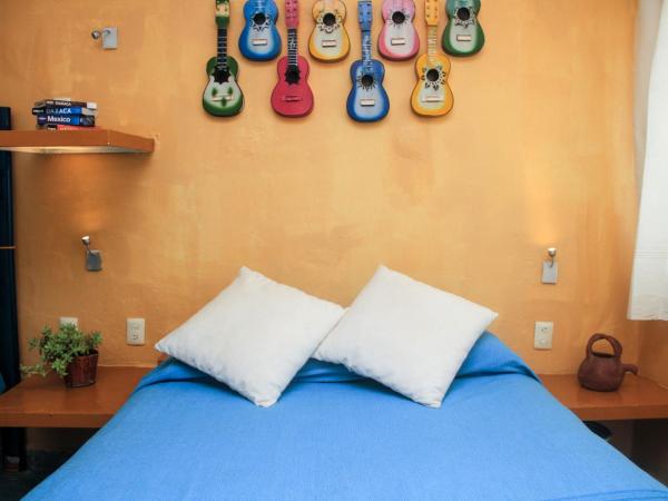 Casa de Don Pablo Hostel : photo 4 de la chambre chambre quadruple avec salle de bains commune