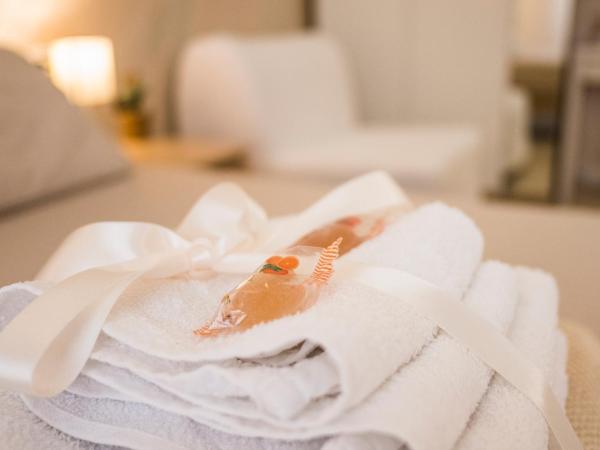 Gold House : photo 10 de la chambre chambre de luxe double ou lits jumeaux avec baignoire spa