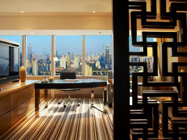 Jin Jiang Tower : photo 3 de la chambre chambre lits jumeaux exécutive villar avec vue sur ville