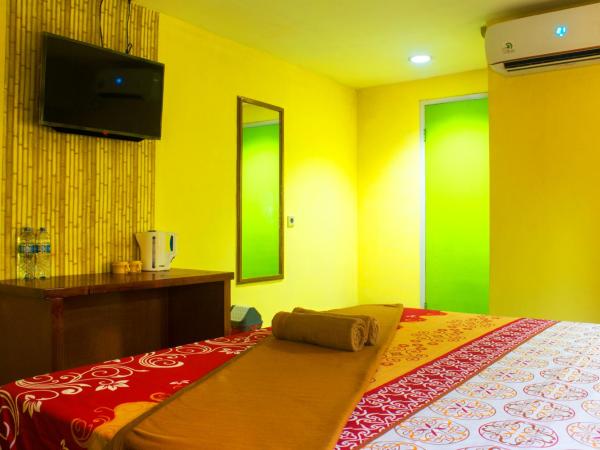 New Priok Indah Syariah Hotel : photo 9 de la chambre chambre deluxe