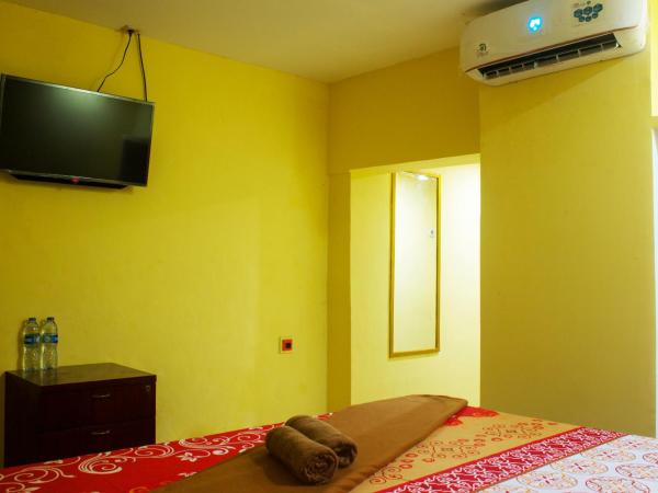 New Priok Indah Syariah Hotel : photo 1 de la chambre chambre simple