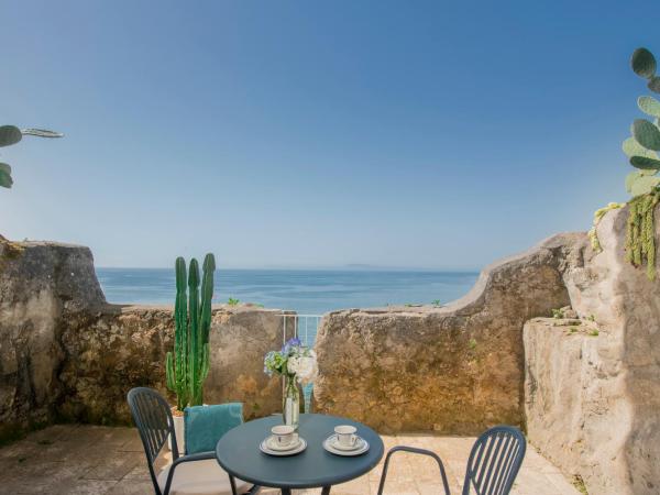 Parco dei Principi : photo 4 de la chambre chambre double ou lits jumeaux deluxe - vue sur mer