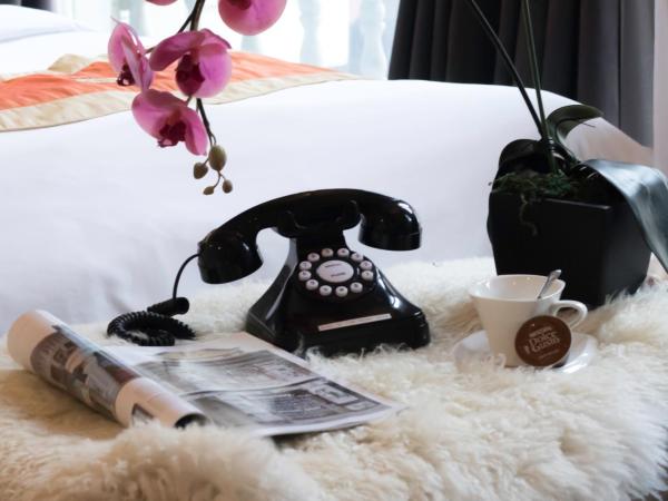 Hotel NuVe Heritage : photo 8 de la chambre hébergement lit queen-size pittoresque