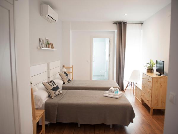 Hotel Smile & Co Hostal Boutique : photo 5 de la chambre chambre lits jumeaux