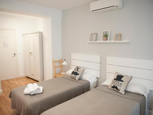 Hotel Smile & Co Hostal Boutique : photo 4 de la chambre chambre lits jumeaux