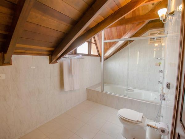 Johnscher by SJ - San Juan Curitiba : photo 2 de la chambre suite lit king-size