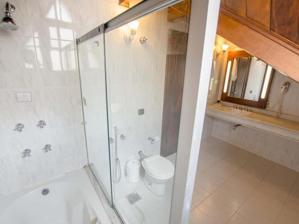 Johnscher by SJ - San Juan Curitiba : photo 4 de la chambre suite lit king-size