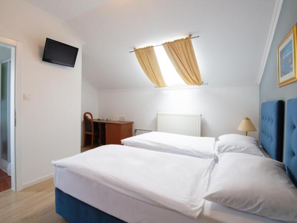 Hotel Vila Tina : photo 8 de la chambre chambre double ou lits jumeaux Économique