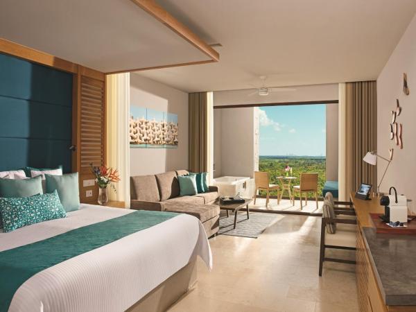 Dreams Playa Mujeres Golf & Spa Resort - All Inclusive : photo 5 de la chambre suite junior - vue sur jardin
