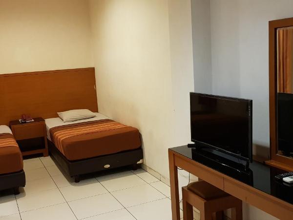 Hotel Dequr Jakarta Kota : photo 10 de la chambre chambre deluxe double ou lits jumeaux