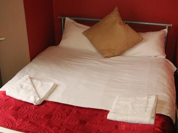 London Olympus Hotel Nirvana : photo 2 de la chambre chambre triple