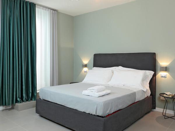 B&Bari, via Cairoli : photo 3 de la chambre chambre triple avec salle de bains privative