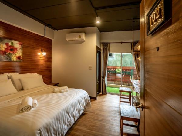 Ingmon House : photo 1 de la chambre chambre lit queen-size avec balcon