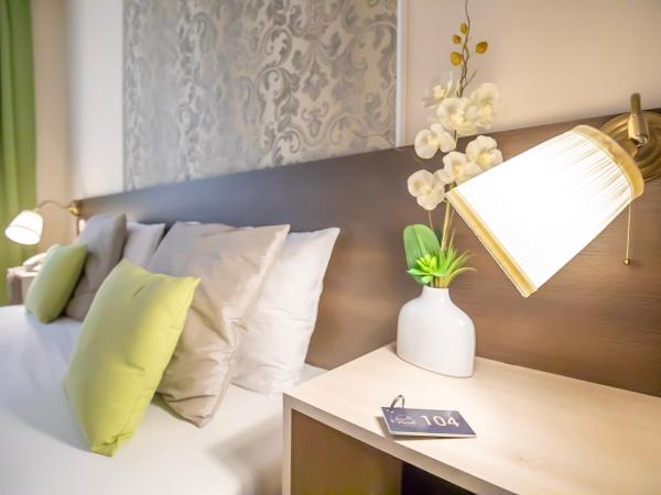 Triple M Hotel : photo 3 de la chambre grande chambre double