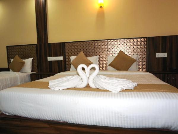 Hotel Kochi Crown : photo 6 de la chambre chambre triple deluxe