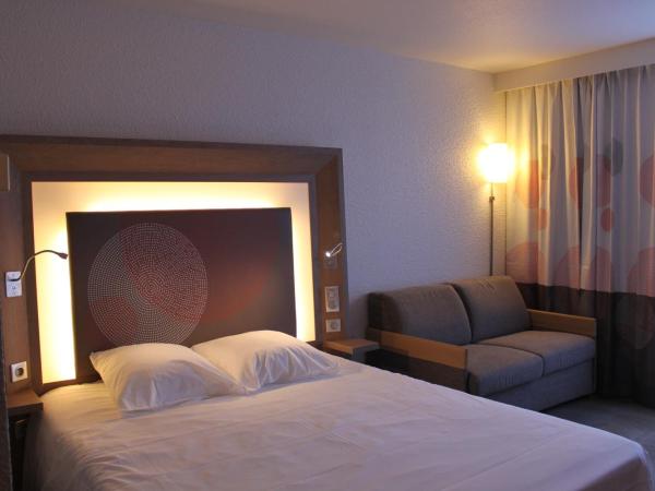 Novotel Amboise : photo 1 de la chambre chambre double standard avec canapé-lit double