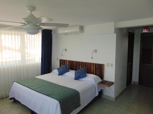 Hotel Rosita : photo 3 de la chambre chambre double avec 2 lits doubles - vue sur océan