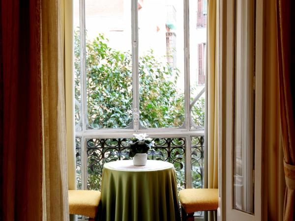 Hostal Macarena : photo 3 de la chambre chambre triple