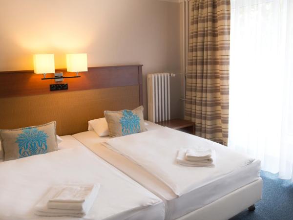 Hotel Marttel : photo 9 de la chambre chambre triple