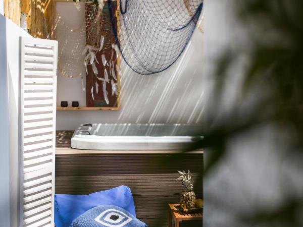 Blue Jasmine Suites : photo 3 de la chambre suiteΙama