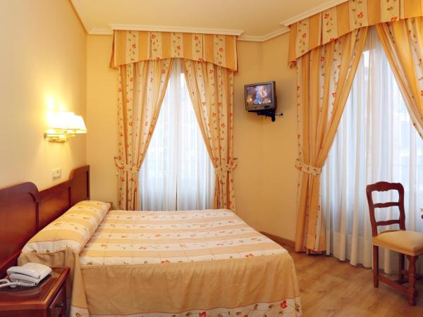 Hostal Silserranos : photo 1 de la chambre chambre familiale