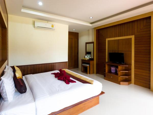 Sleep In Lanta Resort : photo 9 de la chambre bungalow deluxe - vue sur jardin