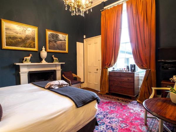 Six Brunton Place Guest House : photo 1 de la chambre chambre double ou lits jumeaux deluxe – vue sur jardin