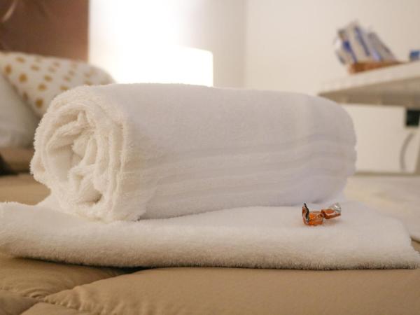 Vitti's Home Verona : photo 2 de la chambre chambre triple confort