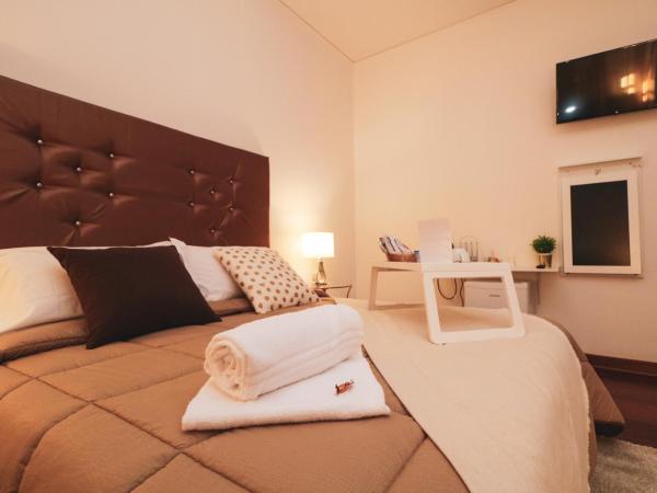 Vitti's Home Verona : photo 3 de la chambre chambre triple confort