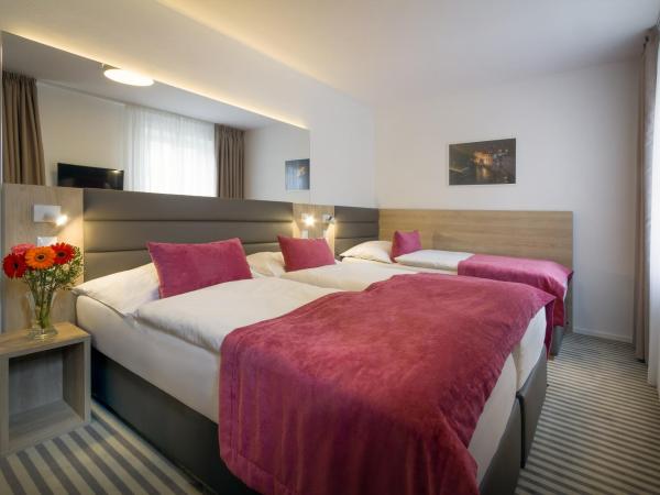 Hotel White Lion : photo 3 de la chambre suite familiale