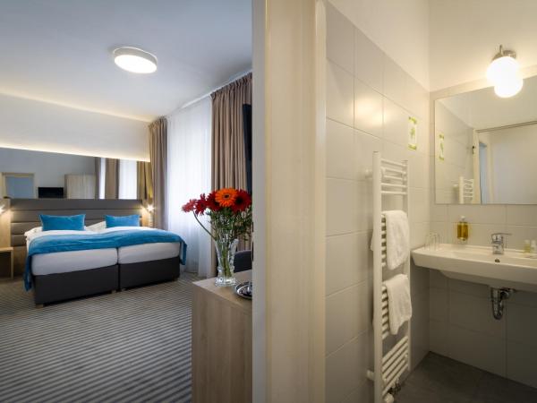 Hotel White Lion : photo 2 de la chambre suite familiale