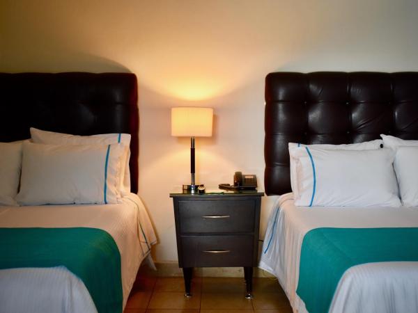 Country Hotel & Suites : photo 2 de la chambre chambre lits jumeaux standard