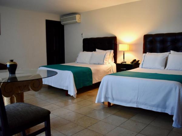 Country Hotel & Suites : photo 5 de la chambre chambre lits jumeaux standard