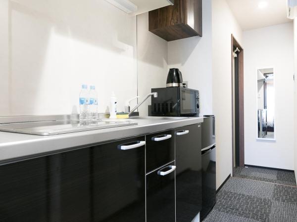 Stay SAKURA Kyoto Shijo Karasuma : photo 5 de la chambre chambre lits jumeaux - vue sur ville