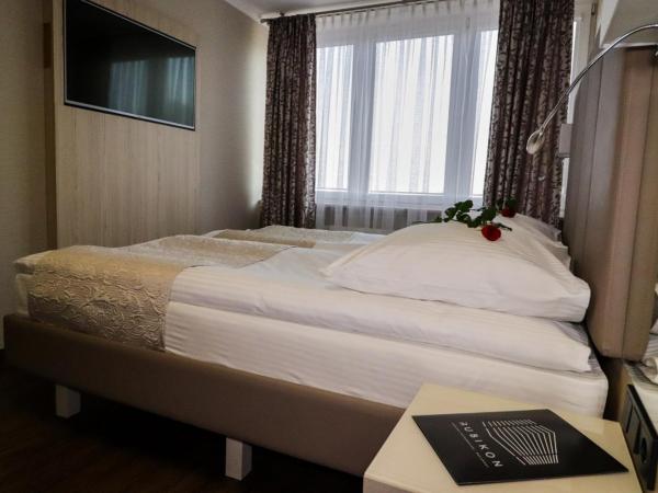 Kompleks restauracyjno-noclegowy Rubikon : photo 9 de la chambre chambre double ou lits jumeaux avec salle de bains