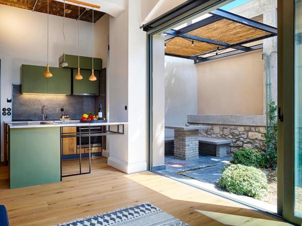 The Foundry Suites : photo 6 de la chambre appartement au rez-de-chaussée - vue sur jardin