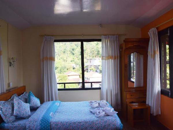 Siddhartha Garden Ayurveda : photo 5 de la chambre chambre double ou lits jumeaux - vue sur montagnes