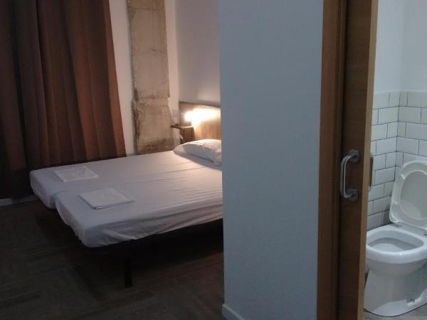 The Market Hostel : photo 4 de la chambre chambre lits jumeaux avec salle de bains privative