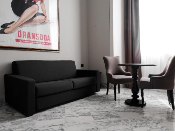 Hotel De Ville : photo 5 de la chambre chambre quadruple de luxe