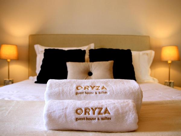 Oryza Guest House& Suites : photo 3 de la chambre chambre double - vue sur jardin