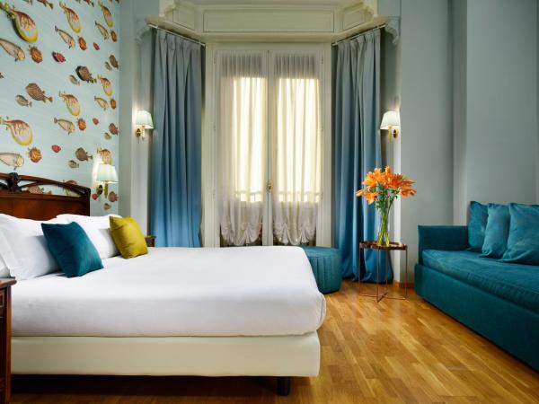 Hotel Continental Genova : photo 9 de la chambre chambre triple